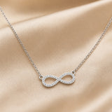 Colar em Tom de Ouro Branco com Pendente Infinito e Zircónia