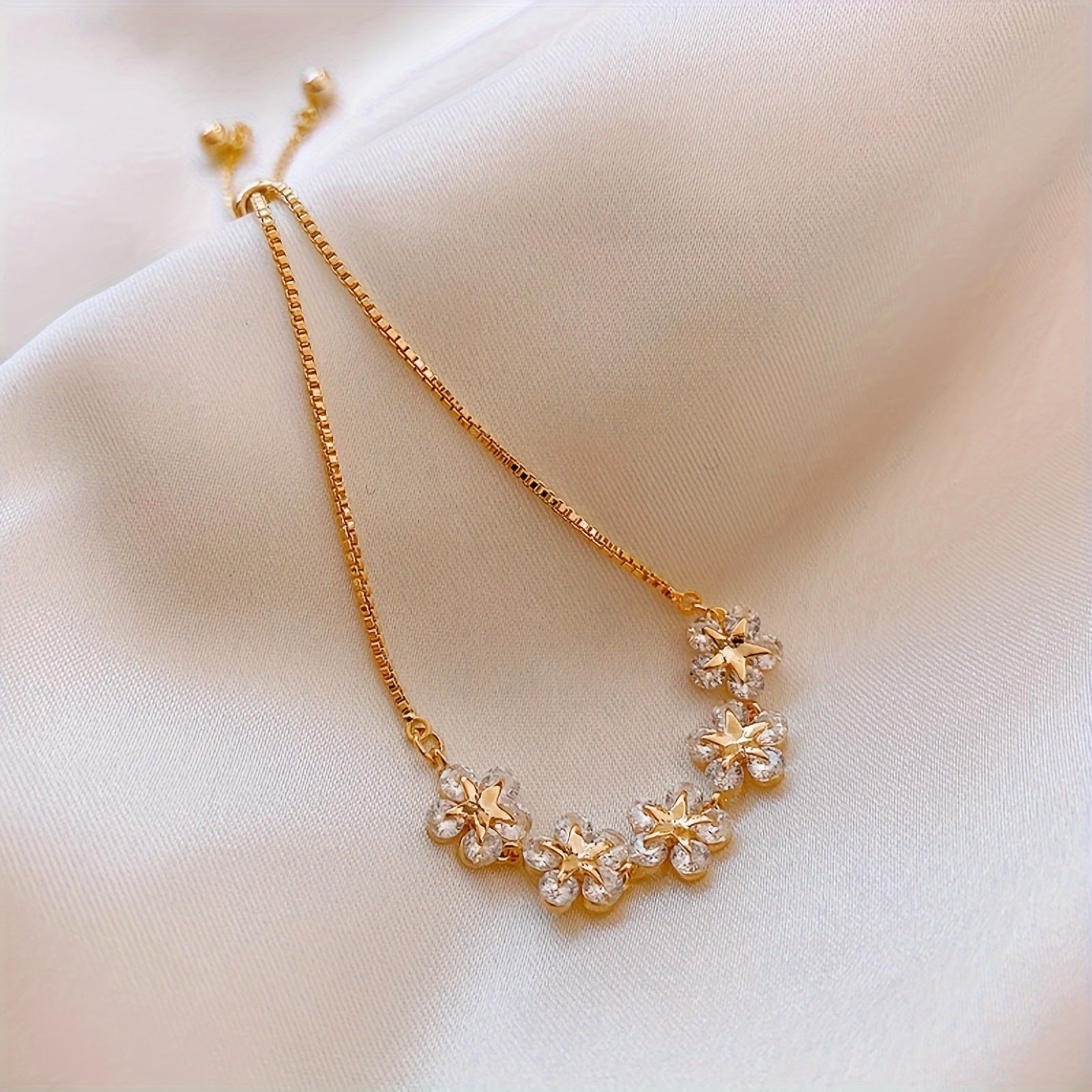Pulseira Floral com Zircónia em Tom de Ouro Branco