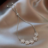 Pulseira Floral com Zircónia em Tom de Ouro Branco